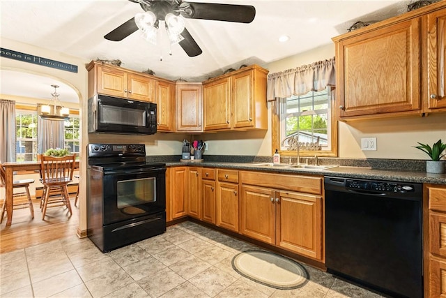 4624 Clear Shade Dr, Windber, PA 15963 - kitchen featuring black appliances, a sink, dark countertops, healthy amount of natural light, and recessed lighting