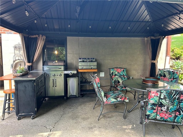 1050 Overlook Dr N, Franklin Twp, PA 15301 - view of patio featuring a gazebo, a grill, and outdoor dining area