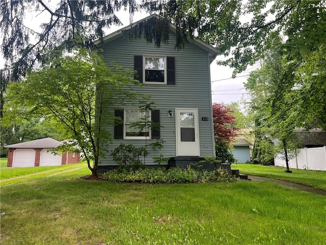 143 College Ave, Hempfield Twp Mer, PA 16125 - traditional-style house with a front yard and a garage