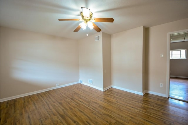 61/63 Orchard, Mckees Rocks, PA 15136 - spare room featuring ceiling fan, wood finished floors, and baseboards