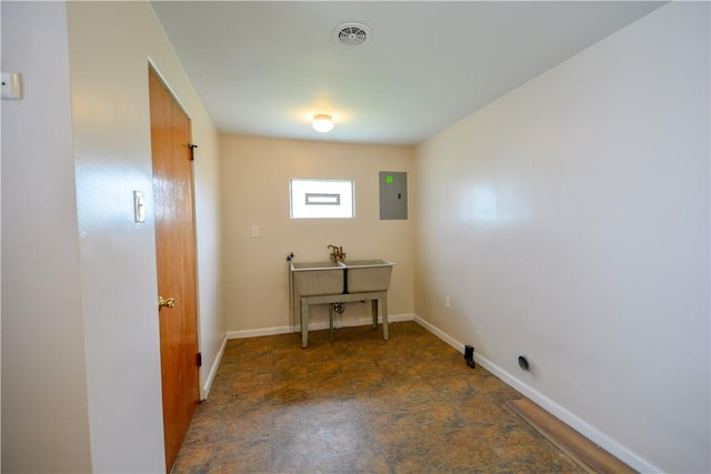 61/63 Orchard, Mckees Rocks, PA 15136 - spare room with electric panel, stone finish floors, and baseboards