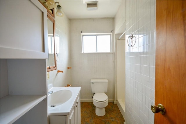 61/63 Orchard, Mckees Rocks, PA 15136 - full bath with toilet, vanity, a shower, and tile walls