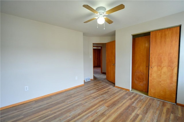 61/63 Orchard, Mckees Rocks, PA 15136 - unfurnished bedroom with wood finished floors, a closet, baseboards, and ceiling fan