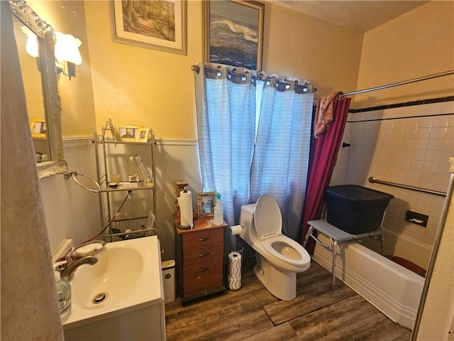 1374 Marlboro Ave, Wilkinsburg, PA 15221 - full bath with vanity, wood finished floors, toilet, and shower / bathtub combination with curtain