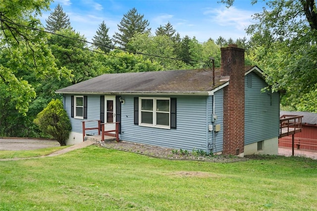 724 Camp Meeting Rd, Bell Acres, PA 15143 - ranch-style house featuring a front yard, a chimney, and a shingled roof