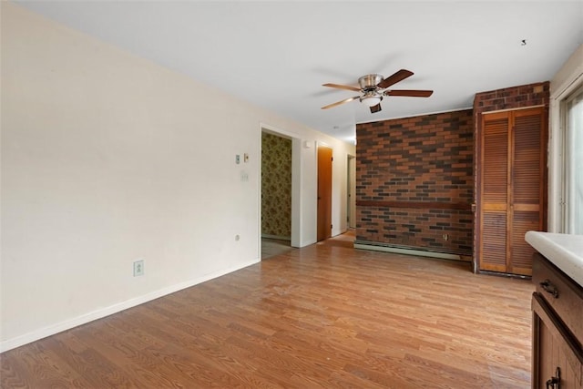 724 Camp Meeting Rd, Bell Acres, PA 15143 - unfurnished living room with ceiling fan, light wood-style floors, baseboards, and baseboard heating