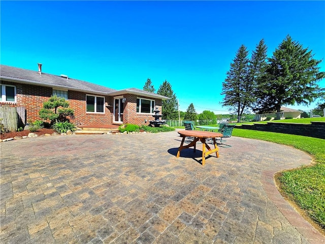 2977 Clay Pike, Sewickley Twp, PA 15678 - back of house featuring brick siding, a patio, and a yard