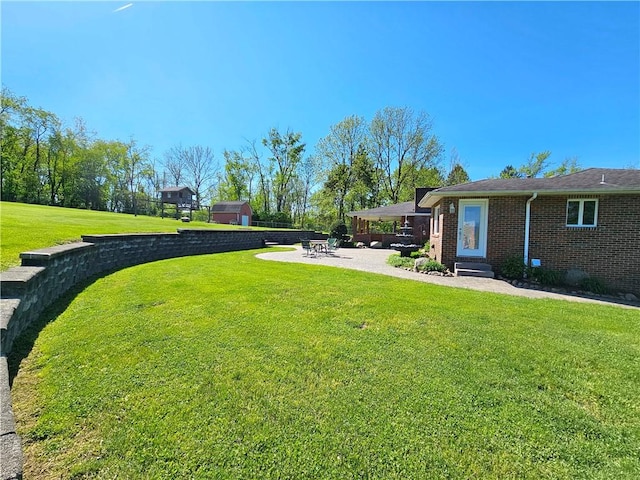 2977 Clay Pike, Sewickley Twp, PA 15678 - view of green lawn featuring a patio area