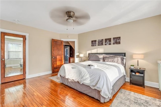 901 Ross Ave, Wilkinsburg, PA 15221 - bedroom with light wood finished floors, baseboards, and a ceiling fan