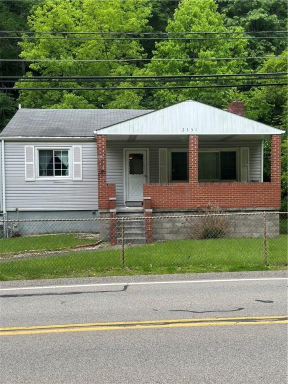 2331 Pitcairn Rd, Monroeville, PA 15146 - view of front of property with a porch and a chimney