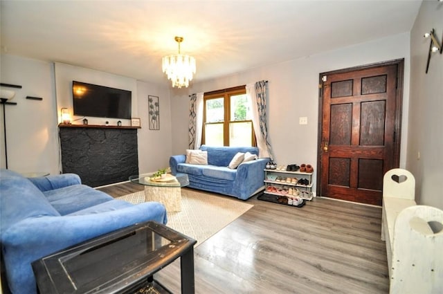 1025 Nevada St, South Strabane, PA 15301 - living area featuring wood finished floors and a chandelier