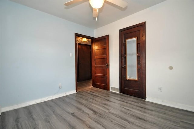 1025 Nevada St, South Strabane, PA 15301 - unfurnished bedroom with wood finished floors, baseboards, and ceiling fan