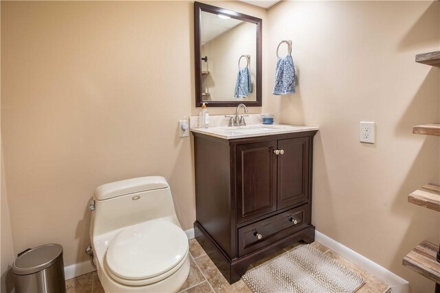 240 Lindsay Rd, Jackson Twp But, PA 16063 - bathroom with baseboards, toilet, and vanity