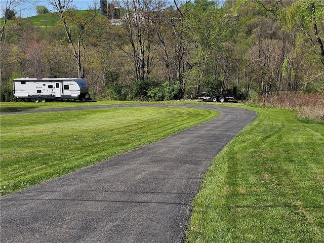 495 Glendale Rd, North Sewickley Twp, PA 15010 - view of asphalt driveway featuring a forest view