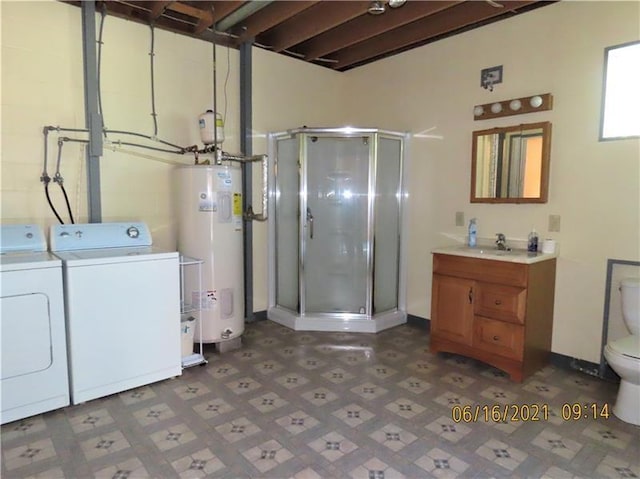 495 Glendale Rd, North Sewickley Twp, PA 15010 - laundry room featuring washer and dryer, electric water heater, and tile patterned floors