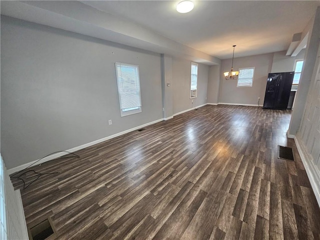 418 Short St, Donora, PA 15033 - empty room featuring a chandelier and dark wood-style flooring