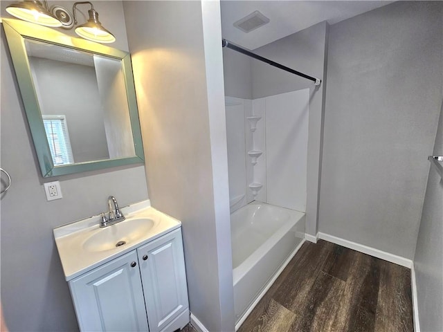 418 Short St, Donora, PA 15033 - bathroom featuring wood finished floors, vanity, and  shower combination
