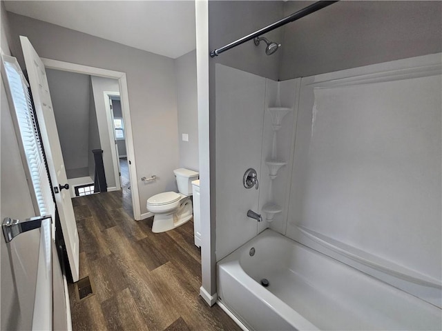 418 Short St, Donora, PA 15033 - bathroom featuring washtub / shower combination and wood finished floors
