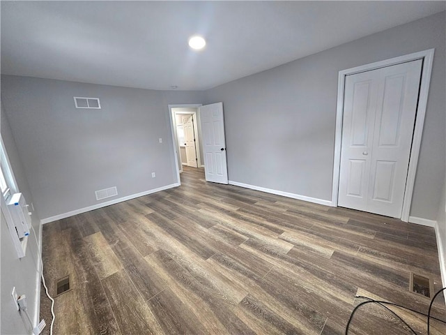418 Short St, Donora, PA 15033 - unfurnished bedroom featuring wood finished floors and baseboards