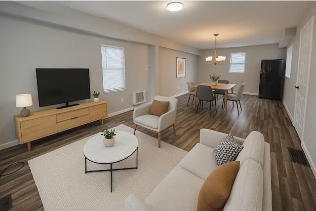 418 Short St, Donora, PA 15033 - living room featuring a chandelier and dark wood-type flooring