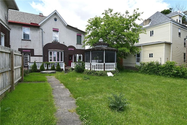 108 Locust St, Mount Oliver, PA 15210 - rear view of house with a yard and a gazebo