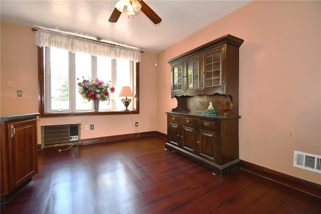 108 Locust St, Mount Oliver, PA 15210 - empty room with ceiling fan, dark wood finished floors, baseboards, and a wall unit AC