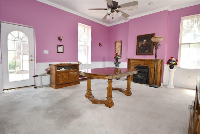 108 Locust St, Mount Oliver, PA 15210 - carpeted dining area featuring a ceiling fan, a wainscoted wall, ornamental molding, and plenty of natural light
