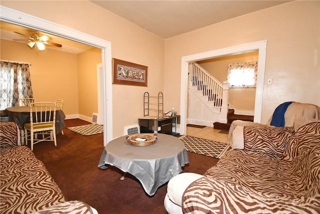 108 Locust St, Mount Oliver, PA 15210 - living area featuring stairway, a ceiling fan, baseboards, and carpet flooring