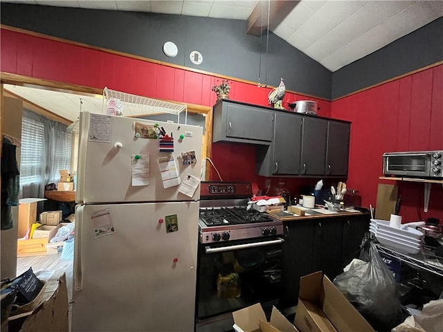 10672 Center Ave, Conneaut Lake, PA 16316 - kitchen with freestanding refrigerator and stainless steel gas range