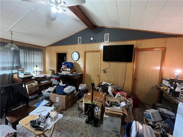 10672 Center Ave, Conneaut Lake, PA 16316 - living room with a ceiling fan, lofted ceiling, and wood walls