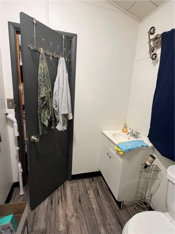10672 Center Ave, Conneaut Lake, PA 16316 - bathroom with vanity and wood finished floors
