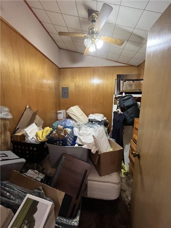 10672 Center Ave, Conneaut Lake, PA 16316 - bedroom with vaulted ceiling and wood walls