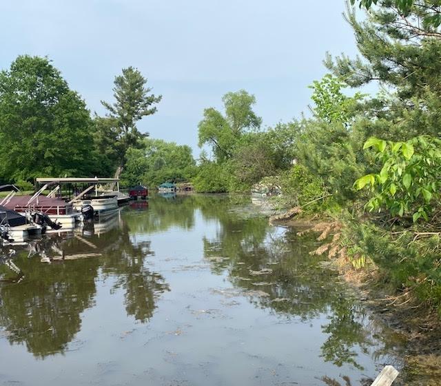 10672 Center Ave, Conneaut Lake, PA 16316 - dock area featuring a water view