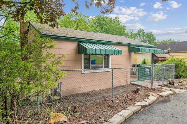 134 Hamilton Dr, Penn Hills, PA 15235 - view of property exterior with a shingled roof