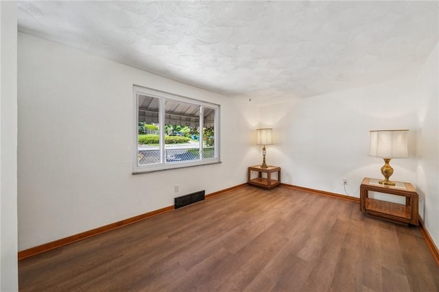 134 Hamilton Dr, Penn Hills, PA 15235 - unfurnished room featuring wood finished floors and baseboards