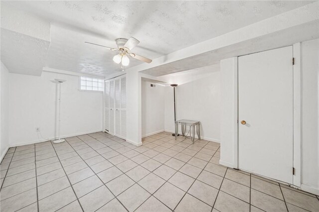 134 Hamilton Dr, Penn Hills, PA 15235 - additional living space featuring a textured ceiling, baseboards, and ceiling fan