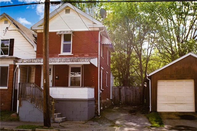 120 N 6th Ave, City Of But Nw, PA 16001 - view of front of property featuring a garage and brick siding