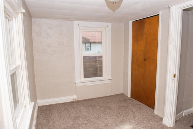 120 N 6th Ave, City Of But Nw, PA 16001 - unfurnished bedroom with carpet floors, a closet, and a textured wall