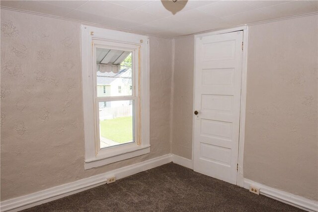 120 N 6th Ave, City Of But Nw, PA 16001 - spare room featuring dark carpet and baseboards