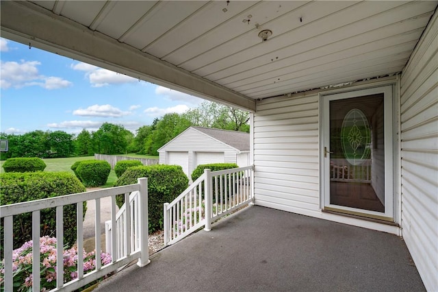 306 N Rd, Franklin Twp But, PA 16001 - view of patio / terrace featuring an outbuilding and a detached garage