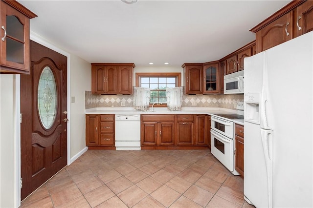 306 N Rd, Franklin Twp But, PA 16001 - kitchen with white appliances, tasteful backsplash, light countertops, and recessed lighting