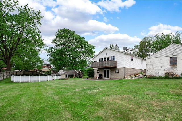 306 N Rd, Franklin Twp But, PA 16001 - view of green lawn featuring an outdoor pool and a deck