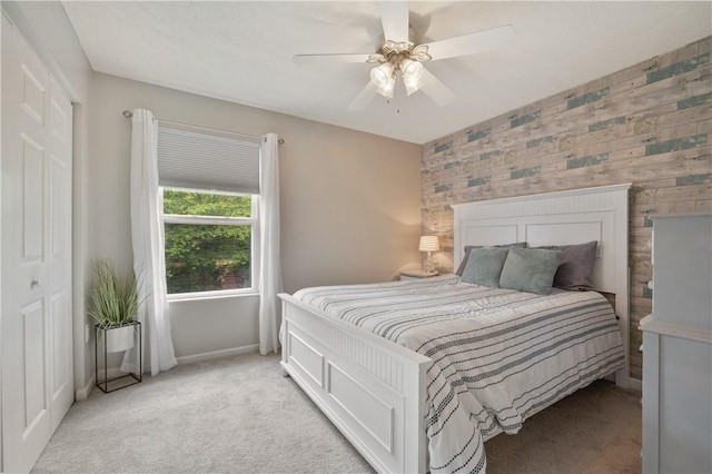 205 Emily Dr, Cranberry Twp, PA 16066 - bedroom with light carpet, a ceiling fan, baseboards, and wooden walls