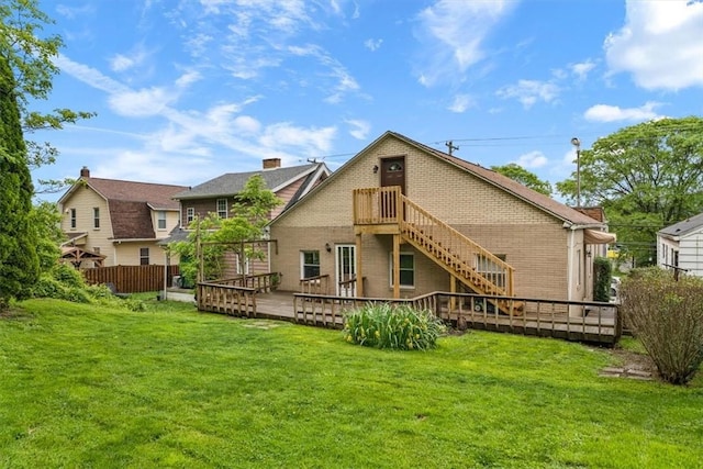 4072 Jordan St, South Heights, PA 15081 - rear view of property with a wooden deck, a lawn, and brick siding
