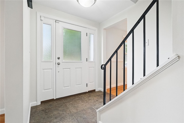 7965 Remington Dr, Mccandless, PA 15237 - foyer entrance featuring baseboards and stairway