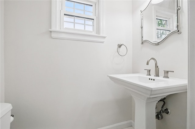7965 Remington Dr, Mccandless, PA 15237 - bathroom featuring toilet, healthy amount of natural light, baseboards, and a sink