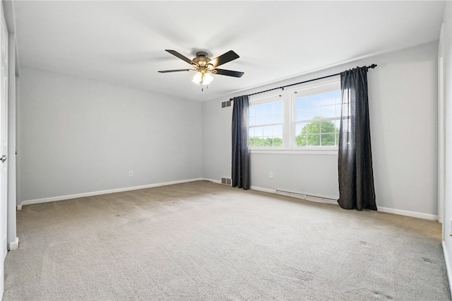 7965 Remington Dr, Mccandless, PA 15237 - unfurnished room with baseboard heating, a ceiling fan, carpet floors, and baseboards
