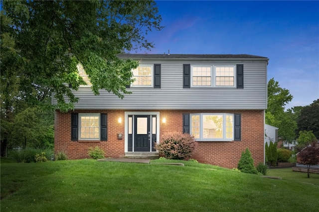 7965 Remington Dr, Mccandless, PA 15237 - colonial-style house with a front lawn and brick siding