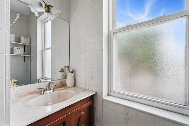 5150 Friendship Ave, Friendship Park, PA 15224 - bathroom with healthy amount of natural light, vanity, and tile walls