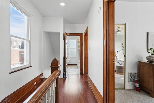 5150 Friendship Ave, Friendship Park, PA 15224 - hallway with healthy amount of natural light, an upstairs landing, wood finished floors, and baseboards